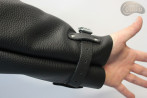 Manchon de protection en cuir avec sangles réglables